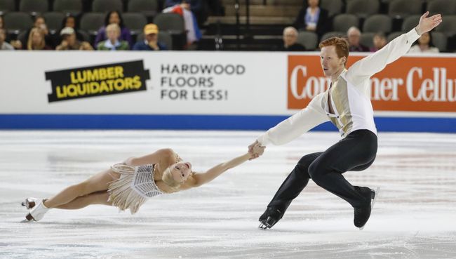 Фигуристы Евгения Тарасова и Владимир Морозов выступают на Skate America