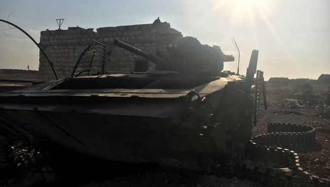 Уничтоженная бронетехника в районе части ПВО на юге Алеппо. Архивное фото Уничтоженная бронетехника в районе части ПВО на юге Алеппо. Архивное фото