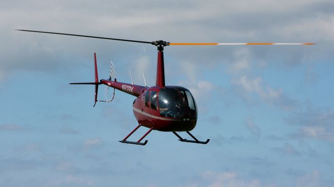 Вертолет Robinson R44. Архивное фото Вертолет Robinson R44. Архивное фото