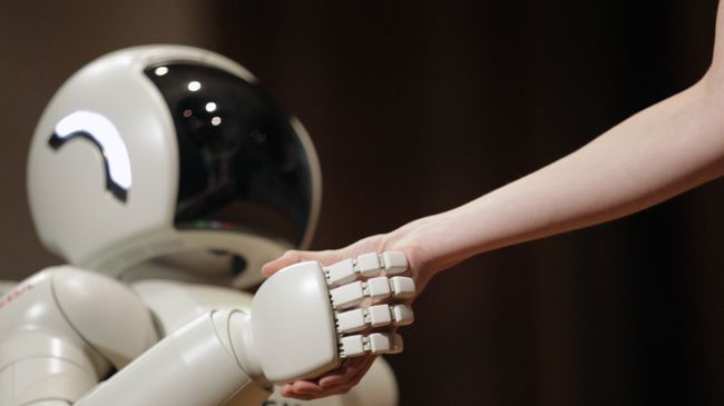 Робот-андроид Asimo корпорации Honda Motors в Белграде. Архивное фото Робот-андроид Asimo корпорации Honda Motors в Белграде. Архивное фото