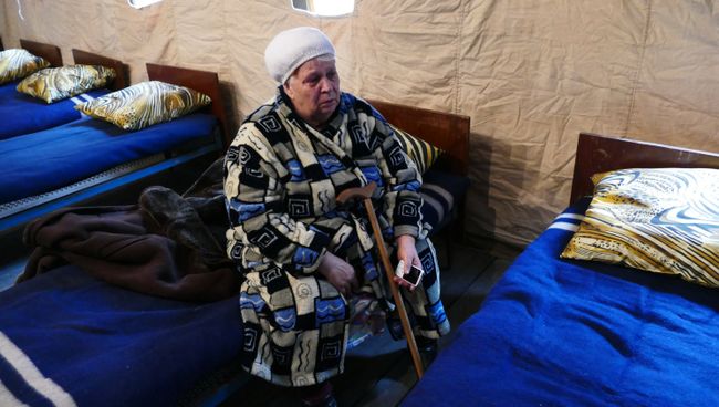 Женщина в пункте для оказания первой медицинской помощи, пострадавших в результате обстрела жилого дома украинскими силовиками в Макеевке. 28 октября 2016 Женщина в пункте для оказания первой медицинской помощи, пострадавших в результате обстрела жилого дома украинскими силовиками в Макеевке. 28 октября 2016