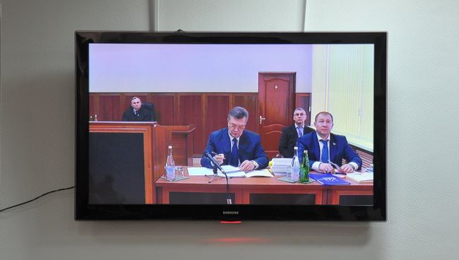 Допрос Виктора Януковича в режиме видеоконференции в качестве свидетеля по делу о беспорядках в Киеве в феврале 2014 года Допрос Виктора Януковича в режиме видеоконференции в качестве свидетеля по делу о беспорядках в Киеве в феврале 2014 года