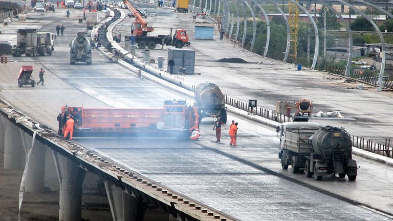 Устройство асфальтового покрытия на Западном скоростном диаметре в Санкт-Петербурге, август 2008 Устройство асфальтового покрытия на Западном скоростном диаметре в Санкт-Петербурге, август 2008