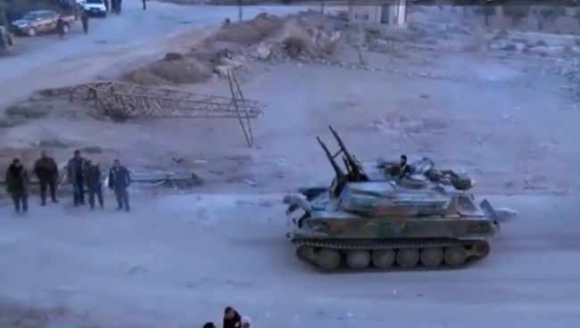 Боевики сдают военную технику сирийским правительственным войскам Боевики сдают военную технику сирийским правительственным войскам