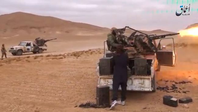 Боевики террористической группировки Исламское государство (ИГ, запрещена в России) в районе Пальмиры Боевики террористической группировки Исламское государство (ИГ, запрещена в России) в районе Пальмиры