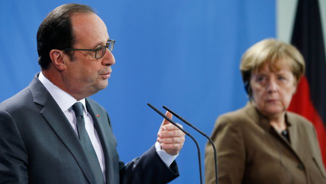 Президент Франции Франсуа Олланд и канцлер Германии Ангела Меркель на совместной пресс-конференции в Берлине. 13 декабря 2016