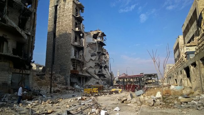 Здания, разрушенные в ходе боевых действий в Аллепо. Архивное фото