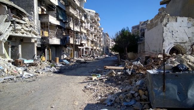 Разрушенные дома в освобожденном районе в Сирии. Архивное фото