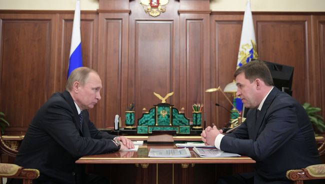 Президент РФ Владимир Путин и губернатор Свердловской области Евгений Куйвашев во время встречи. 24 января 2017
