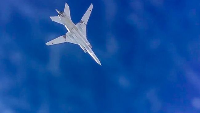 Сверхзвуковой стратегический бомбардировщик-ракетоносец ВКС РФ Ту-22М3 во время нанесения авиационного удара по объектам террористов в Сирии. Архивное фото