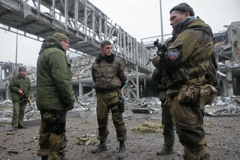 Ополченец ДНР с позывным Гиви в аэропорту Донецка Ополченец ДНР с позывным Гиви в аэропорту Донецка