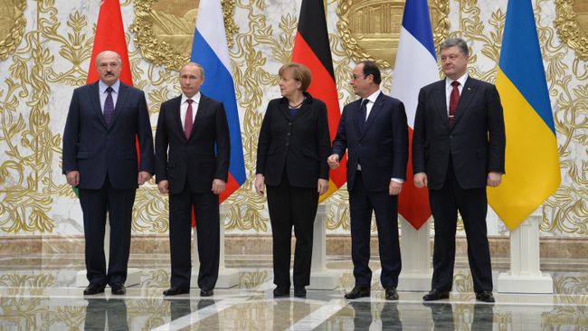 Переговоры лидеров России, Германии, Франции и Украины в Минске. Архивное фото Переговоры лидеров России, Германии, Франции и Украины в Минске. Архивное фото