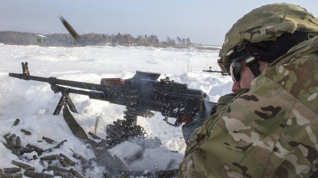 Американский военнослужащий во время учений НАТО на Украине. Архивное фото Американский военнослужащий во время учений НАТО на Украине. Архивное фото