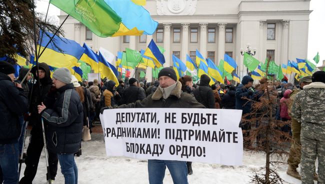 Участник митинга сторонников торговой блокады Донбасса в Киеве. 21 февраля 2017 Участник митинга сторонников торговой блокады Донбасса в Киеве. 21 февраля 2017