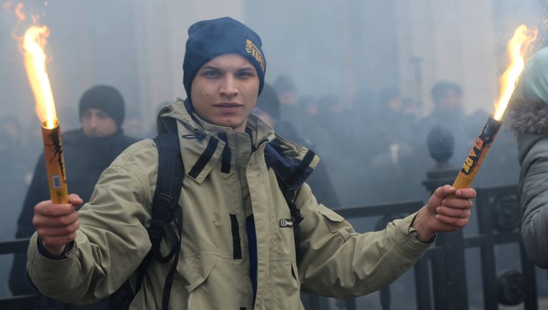 Представители националистических организаций во время митинга в центре Киева. 22 февраля 2017 Представители националистических организаций во время митинга в центре Киева. 22 февраля 2017