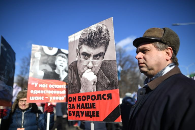 Участники марша памяти Бориса Немцова, приуроченного ко второй годовщине убийства политика Участники марша памяти Бориса Немцова, приуроченного ко второй годовщине убийства политика