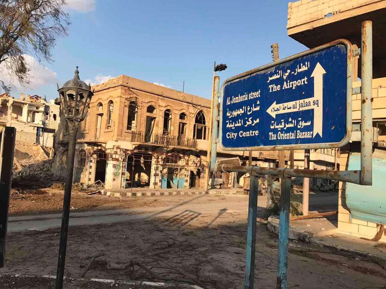 Разрушенные в результате боевых действий дома в жилой части города Пальмира в сирийской провинции Хомс Разрушенные в результате боевых действий дома в жилой части города Пальмира в сирийской провинции Хомс