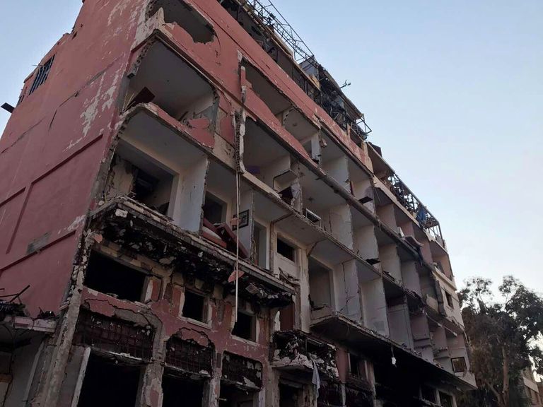 Разрушенные в результате боевых действий дома в жилой части города Пальмира в сирийской провинции Хомс Разрушенные в результате боевых действий дома в жилой части города Пальмира в сирийской провинции Хомс