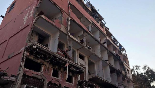 Разрушенные в результате боевых действий дома в сирийской провинции Хомс. Архивное фото Разрушенные в результате боевых действий дома в сирийской провинции Хомс. Архивное фото