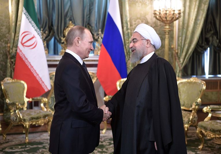 Президент РФ Владимир Путин и президент Исламской Республики Иран Хасан Роухани во время встречи. 28 марта 2017