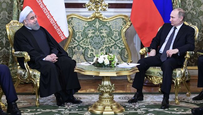 Президент РФ Владимир Путин и президент Исламской Республики Иран Хасан Рухани во время встречи. 28 марта 2017 Президент РФ Владимир Путин и президент Исламской Республики Иран Хасан Рухани во время встречи. 28 марта 2017