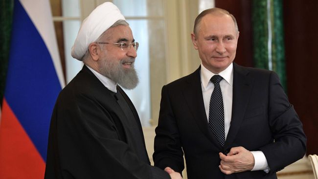 Президент РФ Владимир Путин и президент Исламской Республики Иран Хасан Роухани. Архивное фото Президент РФ Владимир Путин и президент Исламской Республики Иран Хасан Роухани. Архивное фото