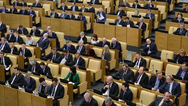 Депутаты на пленарном заседании Государственной Думы. Архивное фото Депутаты на пленарном заседании Государственной Думы. Архивное фото