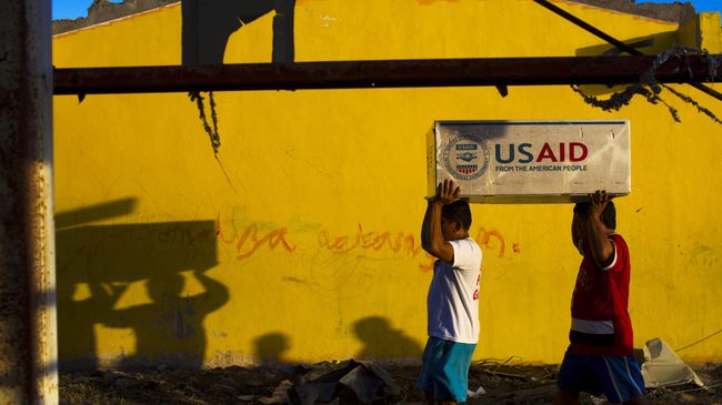 Доставка гуманитарного груза от агентства по международному развитию USAID. Архивное фото Доставка гуманитарного груза от агентства по международному развитию USAID. Архивное фото