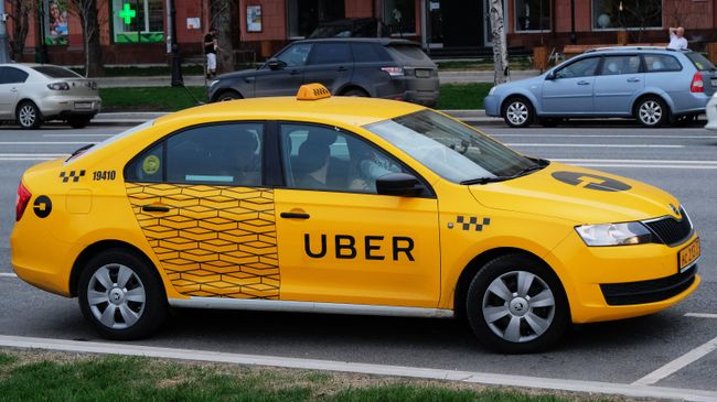Автомобиль службы такси Uber. Архивное фото Автомобиль службы такси Uber. Архивное фото