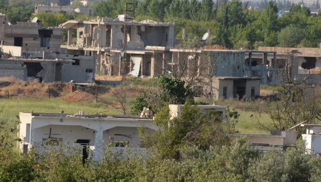 Здания, разрушенные в результате боевых действий в пригороде Дамаска Восточная Гута. Архивное фото Здания, разрушенные в результате боевых действий в пригороде Дамаска Восточная Гута. Архивное фото