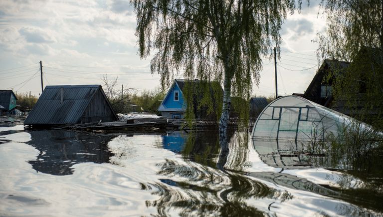 Частные дома в городе Ишим Тюменской области, подтопленные в результате сильного поднятия воды в реках Ишим и Карасуль Частные дома в городе Ишим Тюменской области, подтопленные в результате сильного поднятия воды в реках Ишим и Карасуль