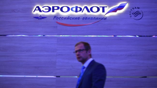 У стенда компании Аэрофлот У стенда компании Аэрофлот