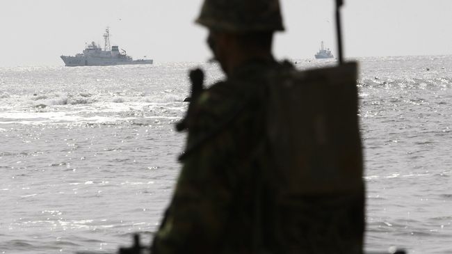 Южнокорейский корабль береговой охраны и морской патруль военно-морского флота. Архивное фото Южнокорейский корабль береговой охраны и морской патруль военно-морского флота. Архивное фото