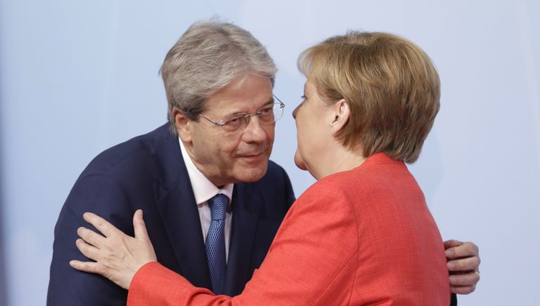 Президент Италии Паоло Джентилони и канцлер ФРГ Ангела Меркель в первый день саммита G-20 в Гамбурге