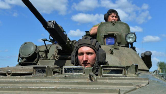 Военнослужащие в БМП-1 во время тактико-специальных учений. Архивное фото Военнослужащие в БМП-1 во время тактико-специальных учений. Архивное фото