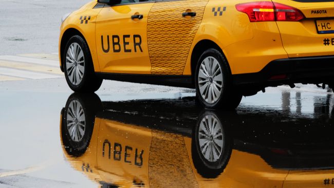 Такси Uber. Архивное фото Такси Uber. Архивное фото