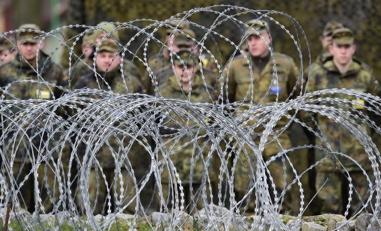 Солдаты на построении в многонациональном корпусе НАТО в Польше