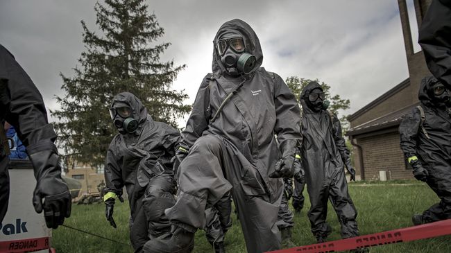 Военнослужащие химико-биологического подразделения армии США во время учений. Архивное фото Военнослужащие химико-биологического подразделения армии США во время учений. Архивное фото