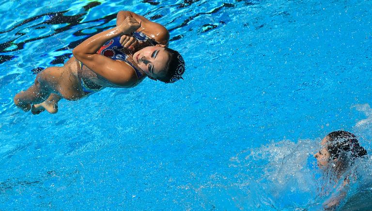 Спортсменки сборной КНР выступают с произвольной программой в финальных соревнованиях по синхронному плаванию среди групп на чемпионате мира FINA 2017 Спортсменки сборной КНР выступают с произвольной программой в финальных соревнованиях по синхронному плаванию среди групп на чемпионате мира FINA 2017