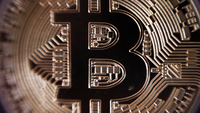 Сувенирная монета криптовалюты биткойн в MaRSe Bitcoin Center в Москве Сувенирная монета криптовалюты биткойн в MaRSe Bitcoin Center в Москве