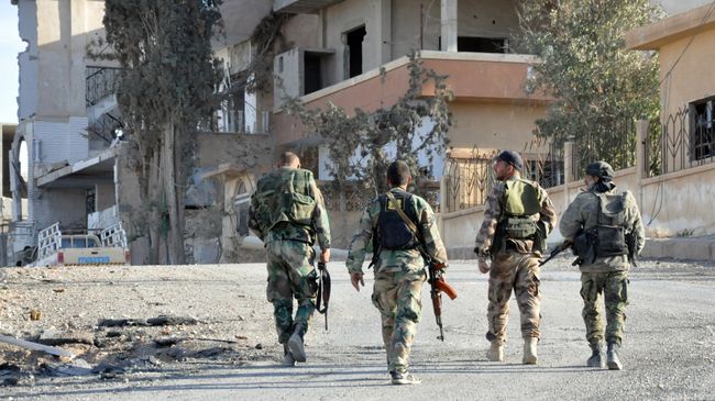Сирийские солдаты в центральной части Сирии в Хомсе Сирийские солдаты в центральной части Сирии в Хомсе