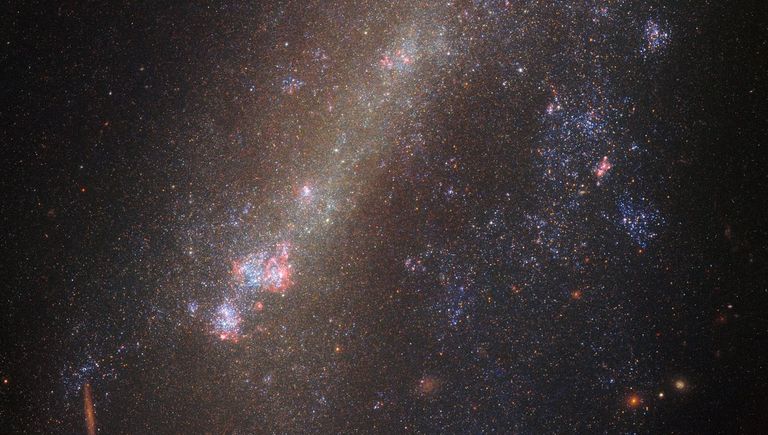 Галактики IC 1727 и NGC 672, столкнувшиеся в недавнем прошлом Галактики IC 1727 и NGC 672, столкнувшиеся в недавнем прошлом