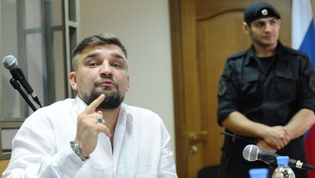 Рэпер Василий Вакуленко во время заседания Октябрьского районного суда Ростова-на-Дону. 15 августа 2017 Рэпер Василий Вакуленко во время заседания Октябрьского районного суда Ростова-на-Дону. 15 августа 2017