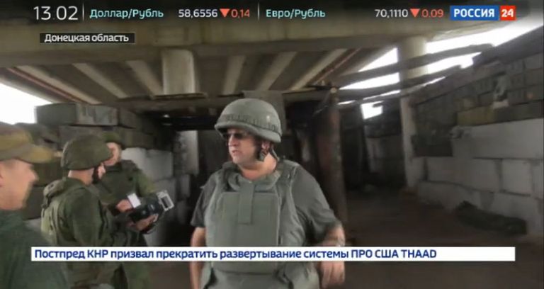 Стоп-кадр репортажа об обстреле съемочной группы телеканала Россия 24