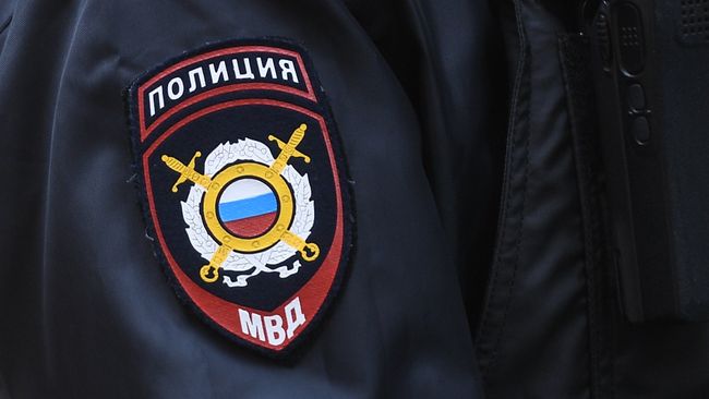 Нашивка на рукаве сотрудника полиции Нашивка на рукаве сотрудника полиции