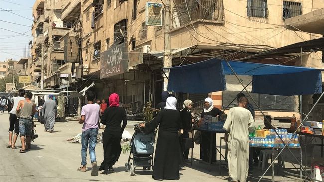 На одной из улиц в Дэйр-эз-Зоре. Архивное фото На одной из улиц в Дэйр-эз-Зоре. Архивное фото