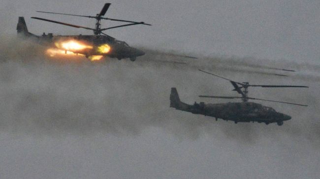 Вертолёты Ка-52 Аллигатор во время совместных стратегических учений (ССУ) вооружённых сил России и Белоруссии на Лужском полигоне в Ленинградской области. Архивное фото Вертолёты Ка-52 Аллигатор во время совместных стратегических учений (ССУ) вооружённых сил России и Белоруссии на Лужском полигоне в Ленинградской области. Архивное фото