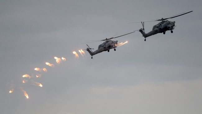 Вертолеты Ка-52 ВКС России во время учений вооруженных сил России и Белоруссии Запад-2017. Архивное фото Вертолеты Ка-52 ВКС России во время учений вооруженных сил России и Белоруссии Запад-2017. Архивное фото
