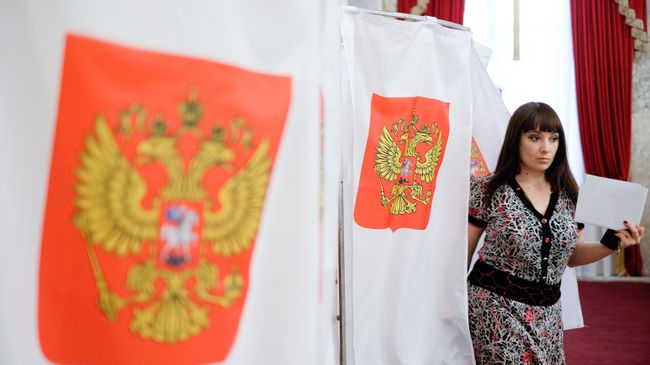 Жительница Краснодара на избирательном участке. Архивное фото Жительница Краснодара на избирательном участке. Архивное фото