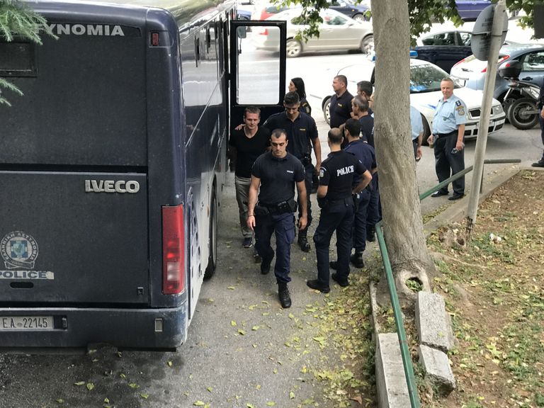 Александр Винник в сопровождении греческой полиции